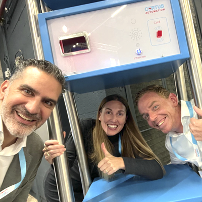 Group of colleagues having fun at an exhibition